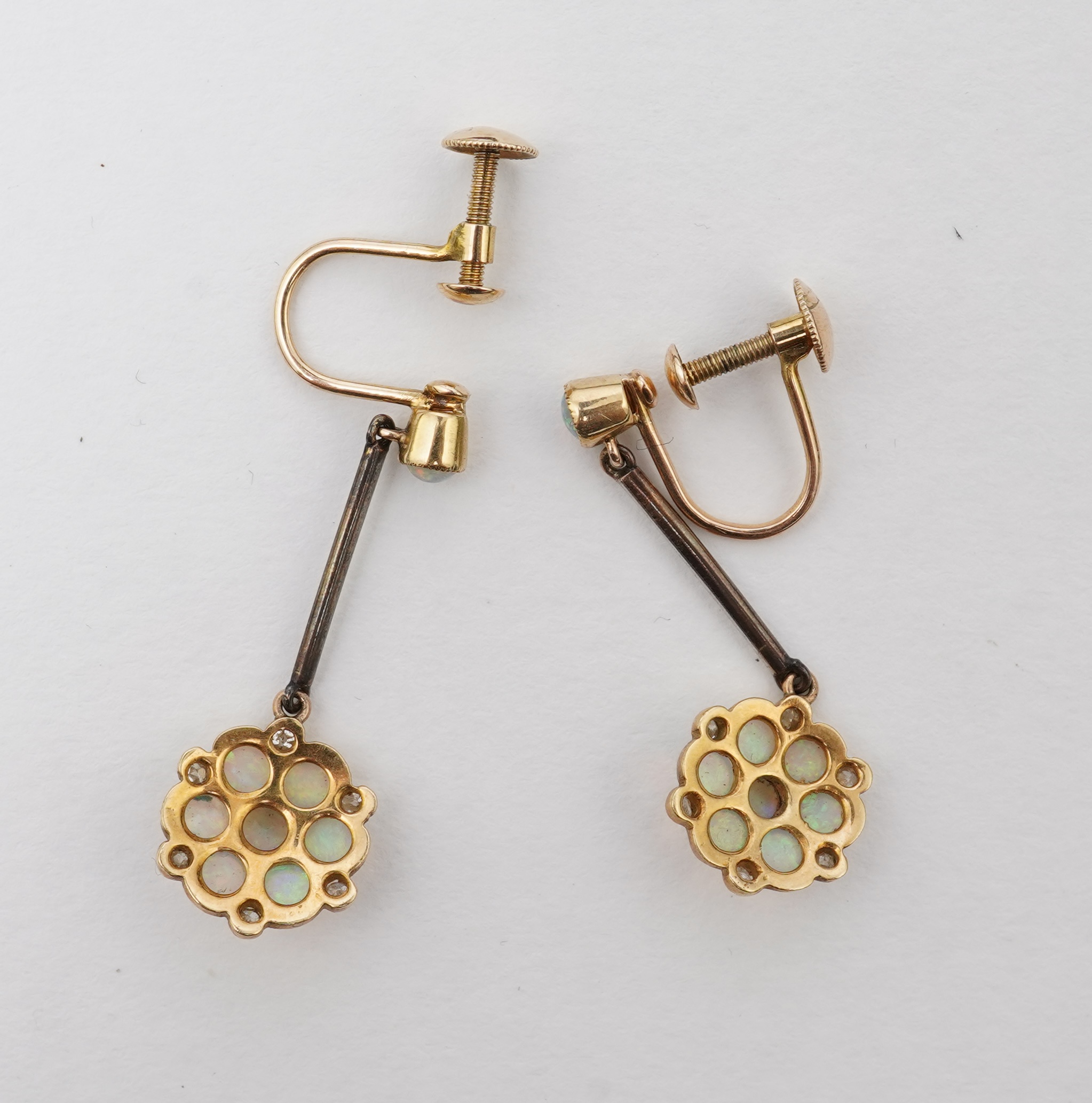 An attractive Edwardian opal and diamond demi-parure, early 20th century